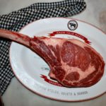 Tomahawk Steak: The Quintessential Meat Lollipop