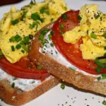 Scrambled Egg Breakfast Toast with Tomato and Chive Goat Cheese