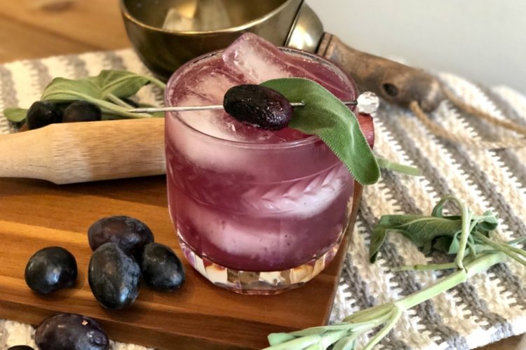 Off the Vine: A Thanksgiving Day Cocktail #thanksgivingcocktail #sagecocktail #vodkacocktail #muddledsageandgrapes #freshherbcockail